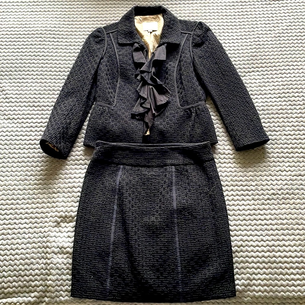 Black jacket and skirt suit combo